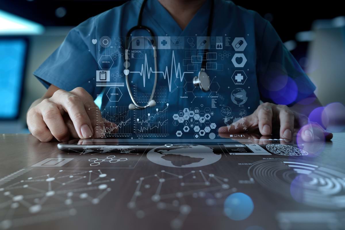 Medical doctor working with modern computer interface as medical network concept.