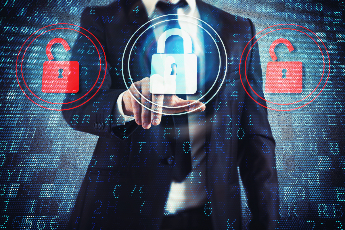 Man pointing at digital cyber security padlocks